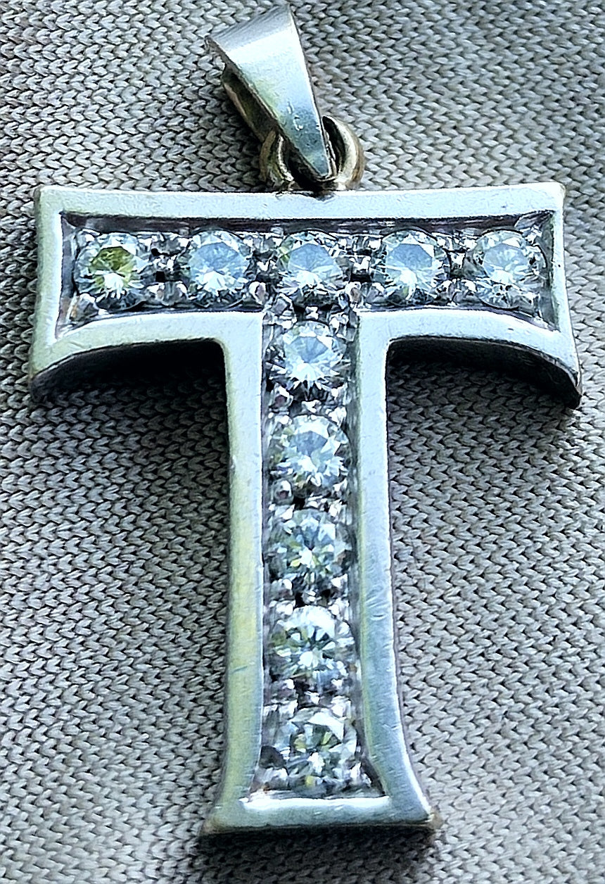 Letra T de oro blanco