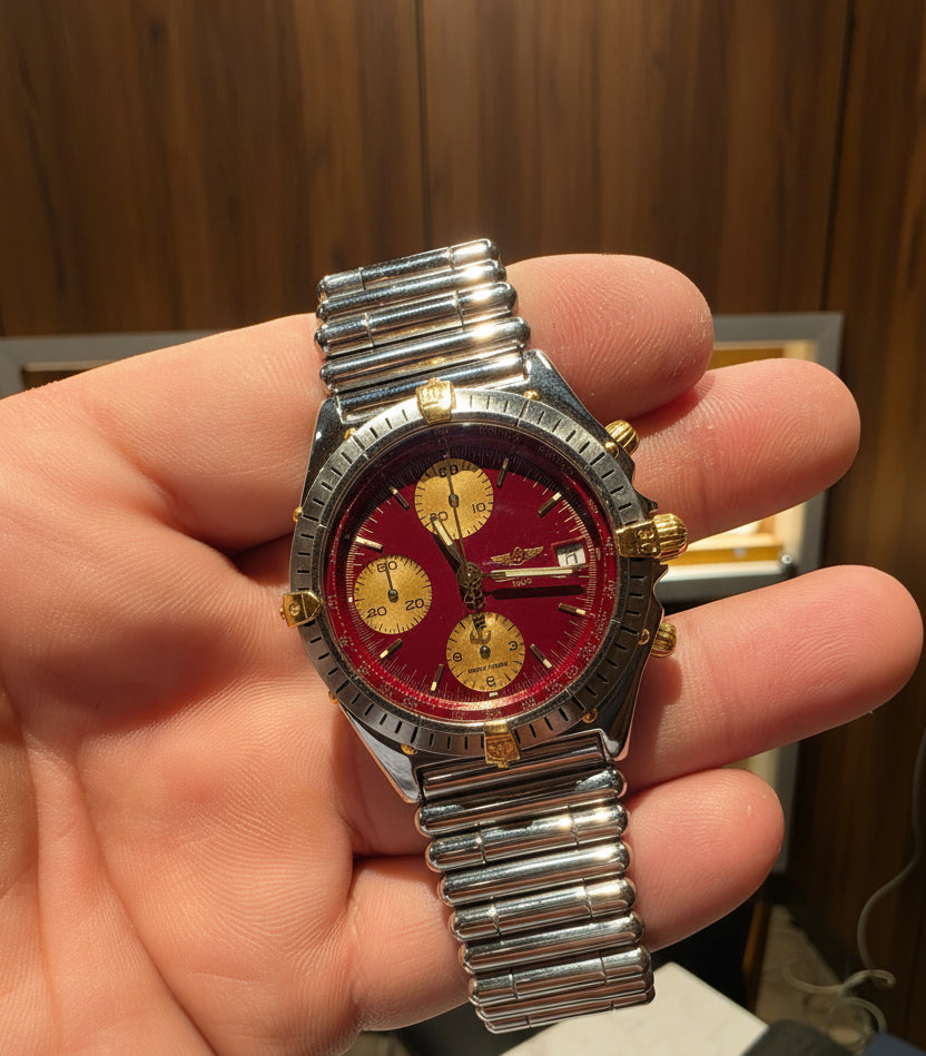 Breitling Chronomat B13048 — Acero & Oro, Esfera Burgundy
